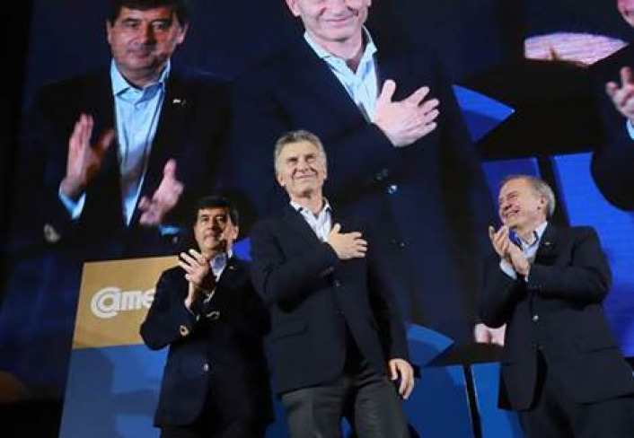 El titular del Consejo Directivo de CAME, Gerardo Daz Beltrn, junto al presidente Mauricio Macri y al secretario general de la entidad, Jos Bereciarta